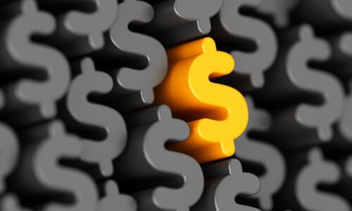 Yellow dollar sign standing out amongst grey dollar signs, illustrating dynamic pricing.