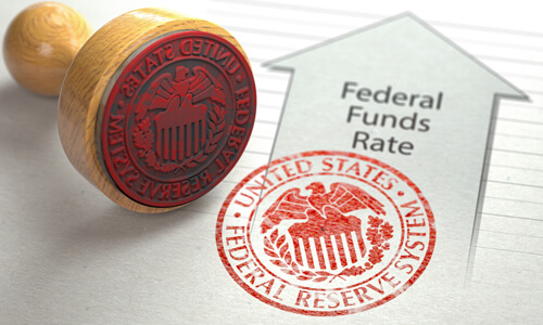 Stamp of United States Federal Reserve System, signifying change to Federal Funds Rate