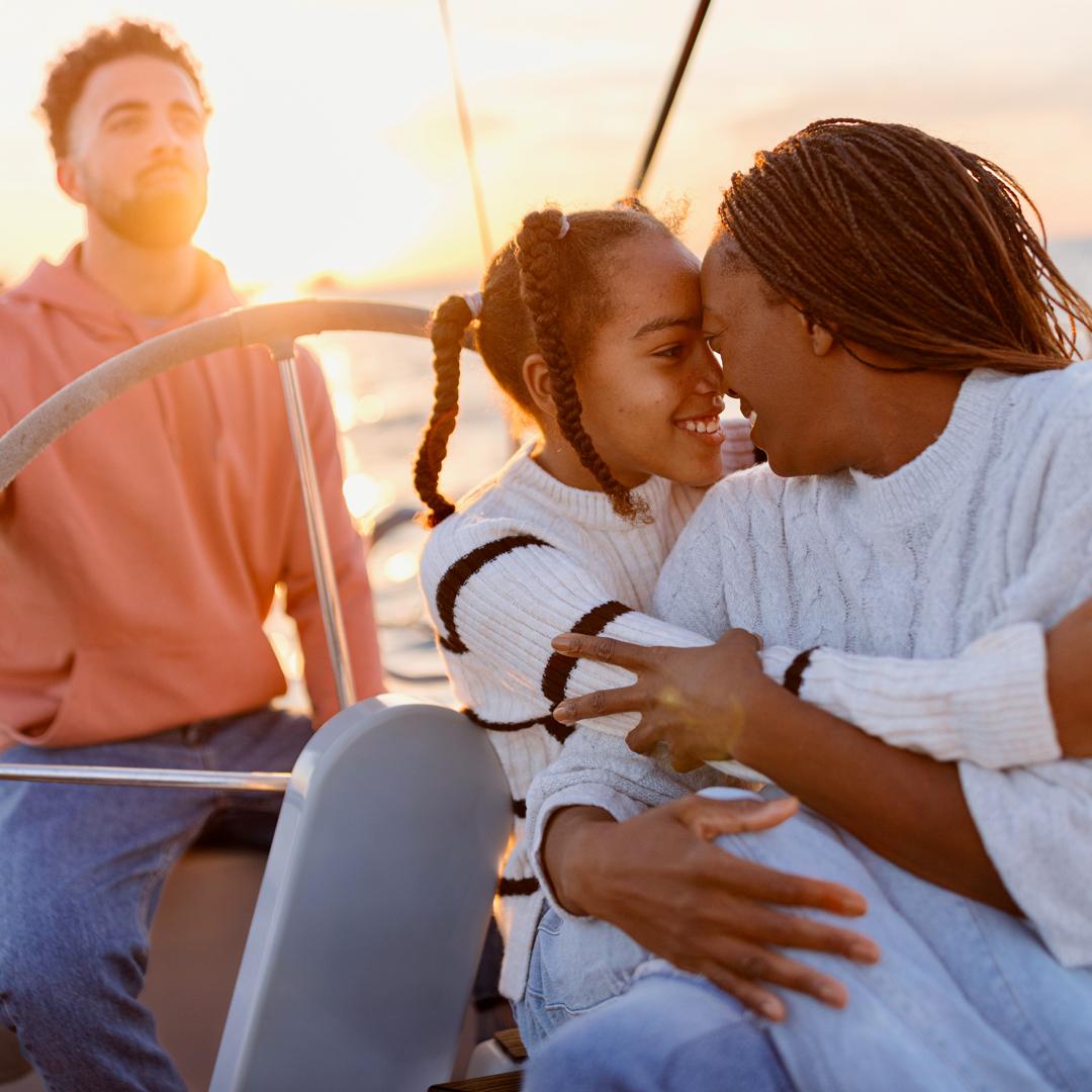 Family on sailboat - generational wealth concept