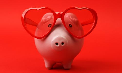 Valentines Day Piggy Bank wearing heart shaped glasses