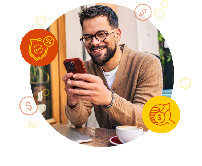 Man at cafe looking at his mobile phone