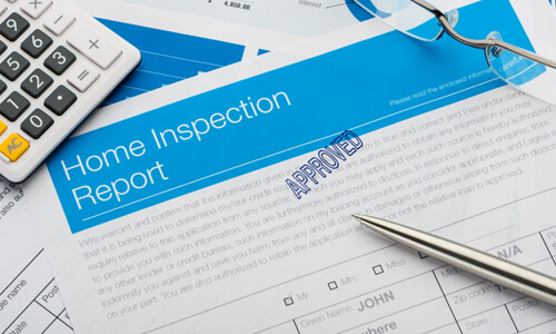 Imaged of Approved Home Inspection document, calculator.